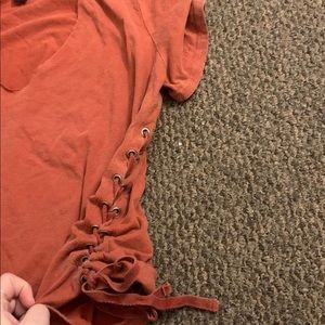 V-neck choker style t-shirt, ties up the sides